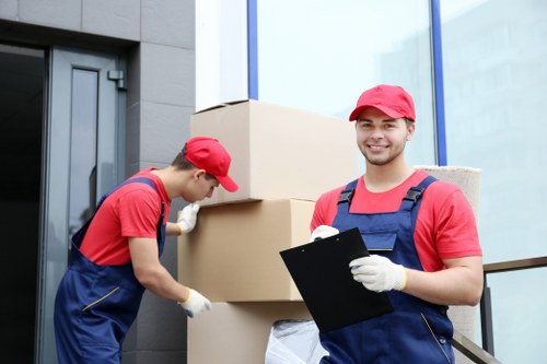 Moving team preparing equipment and load for a safe removal job