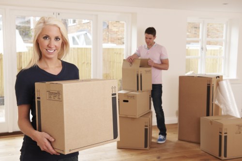 Removal van and moving boxes for a home move in Upminster